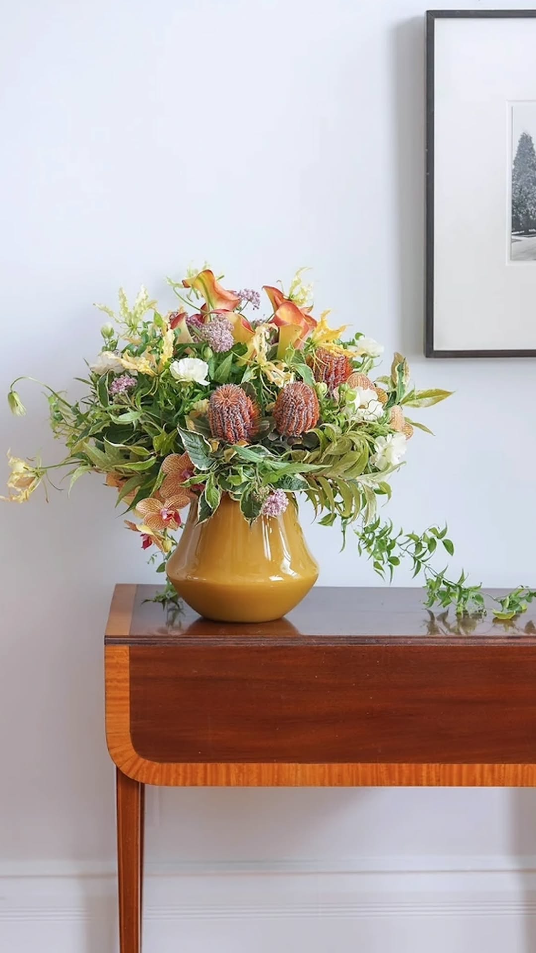 Lowlands Design Orchid Pot in yellow with floral arrangement, perfect for home decor