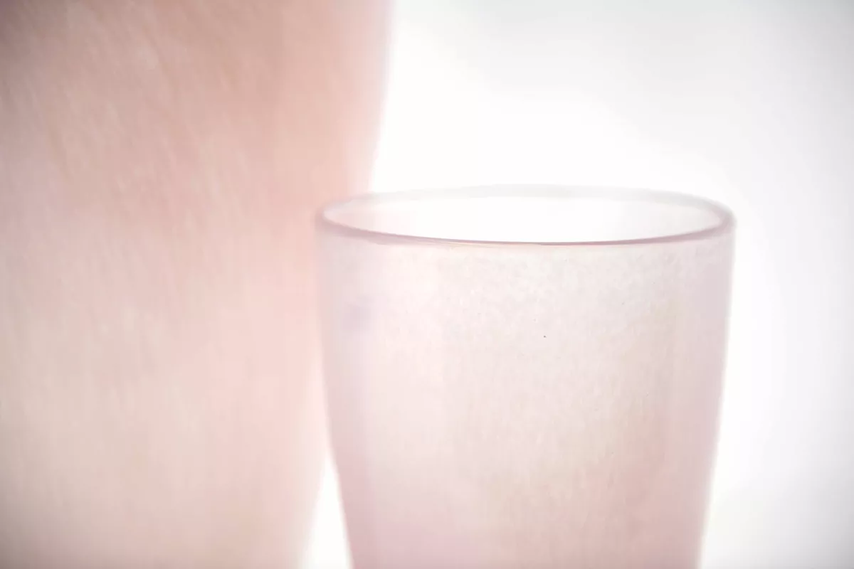 Minimalist pink flower vase by Lowlands Design with smooth frosted glass finish