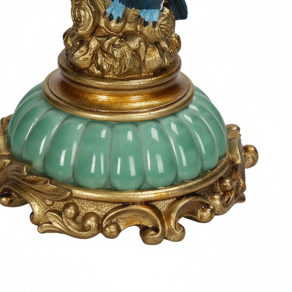 Vintage bird candelabra in green and gold finish, intricately detailed, perfect for elegant candle displays