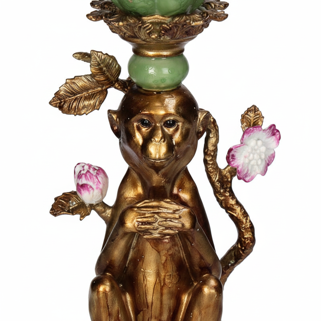 Vintage candleholder monkey in gold finish with floral accents and green top, perfect for elegant decor