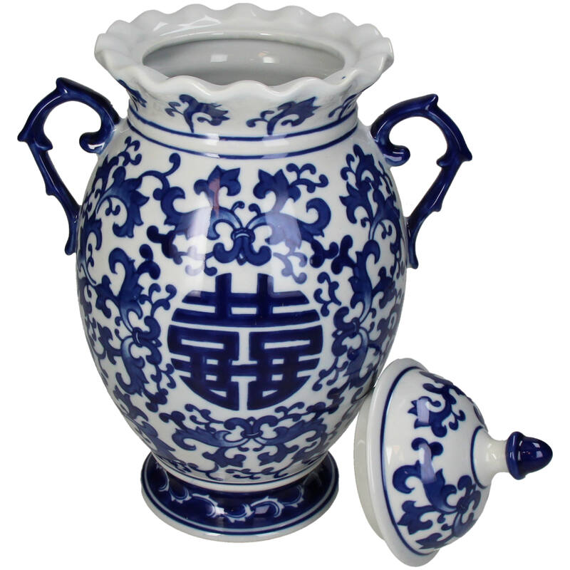 White Blue Porcelain Chinoiserie vase with intricate floral designs and a matching lid from Lowlands Design